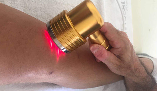 Physiotherapist use Laser therapy treat leg pain